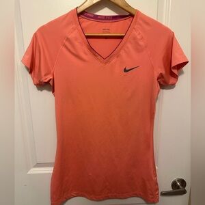 Nike Pro women’s medium vneck short sleeve athletic top. Coral color